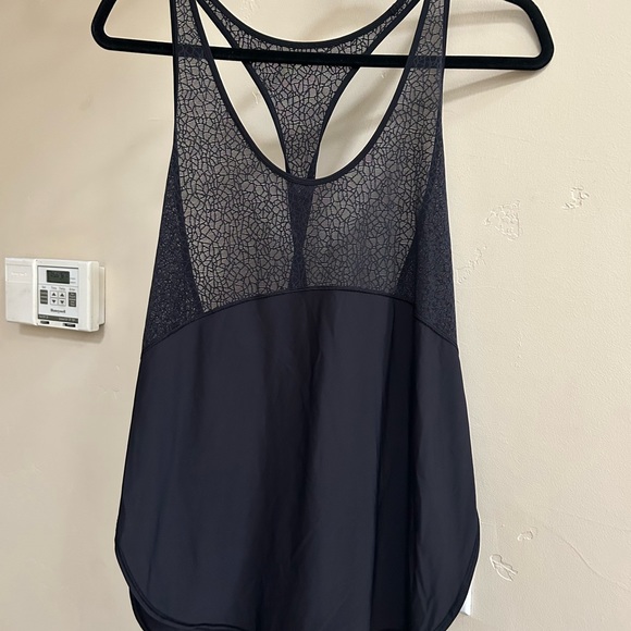 2 lulu tanks. Like new condition, light weight and great for layering. - Picture 2 of 5